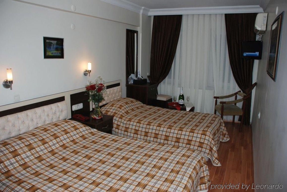 Hotel Grand Mark Истанбул Стая снимка